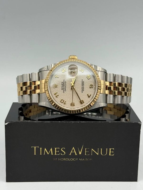 Rolex Datejust 36mm Ref. 16233 in Two-Tone Yellow Gold and Steel, featuring a White Computer Motif dial with Arabic numerals, fluted bezel, and Jubilee bracelet.