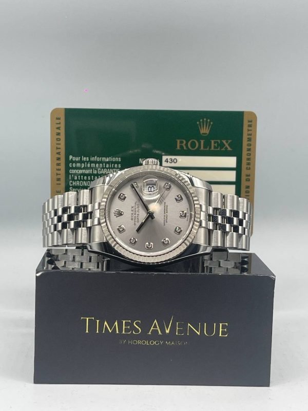Preowned 2012 Rolex Datejust 36 116234 silver dial with 10 diamonds white gold fluted bezel and Jubilee bracelet.