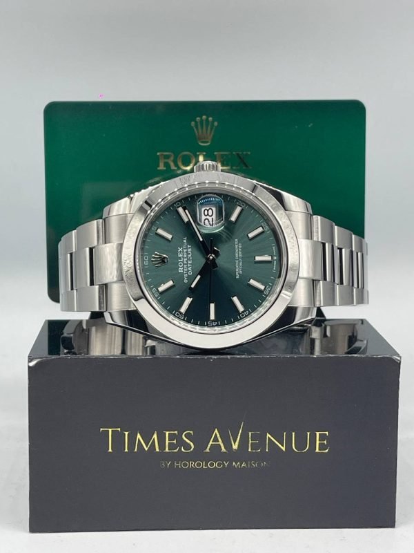 Preowned 2024 Rolex Datejust 41 126300 mint green dial watch with smooth bezel and Oyster bracelet in Singapore.